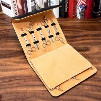 Ten-piece leather scissor case with divider