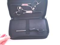 Black four-sleeve leather scissor pouch