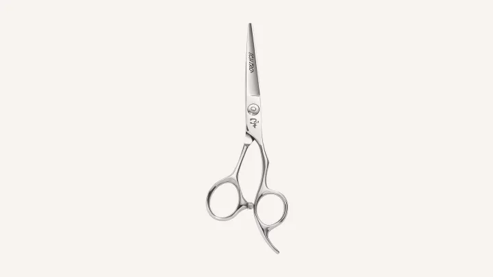 Ichiro Ergo apprentice cutting scissor with an offset handle.