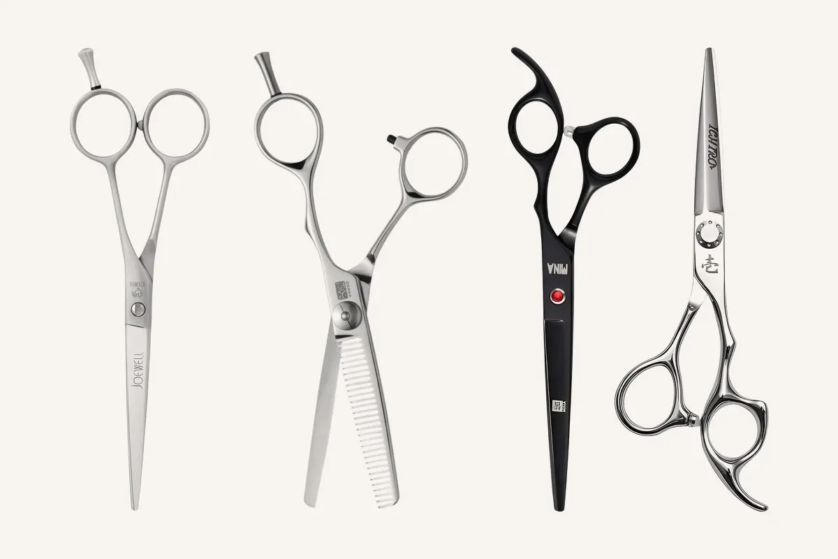 Four professional hair scissors side by side: a Joewell Classic PRO cutter, a Kasho Design Master 30-tooth thinner, a black Mina Dark Gem cutter and an Ichiro Taiyo cutter.