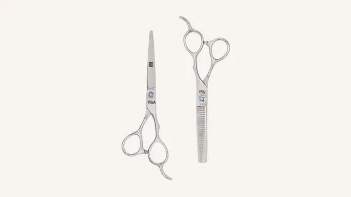 Mina Umi set catalogue photo: an offset cutting scissor beside a thinning scissor.