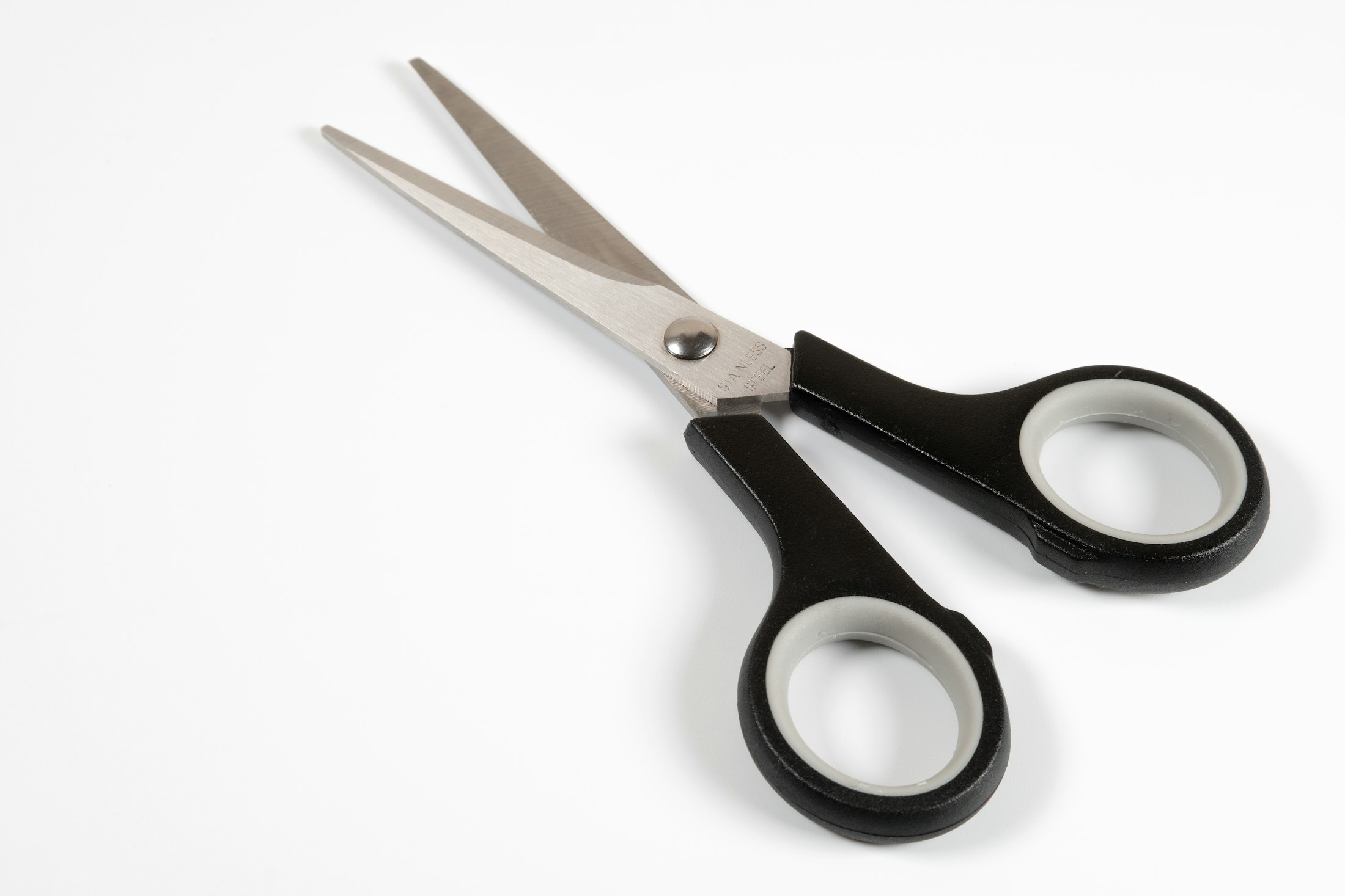 Fuji shears and maintenance cloth on a clean white bench