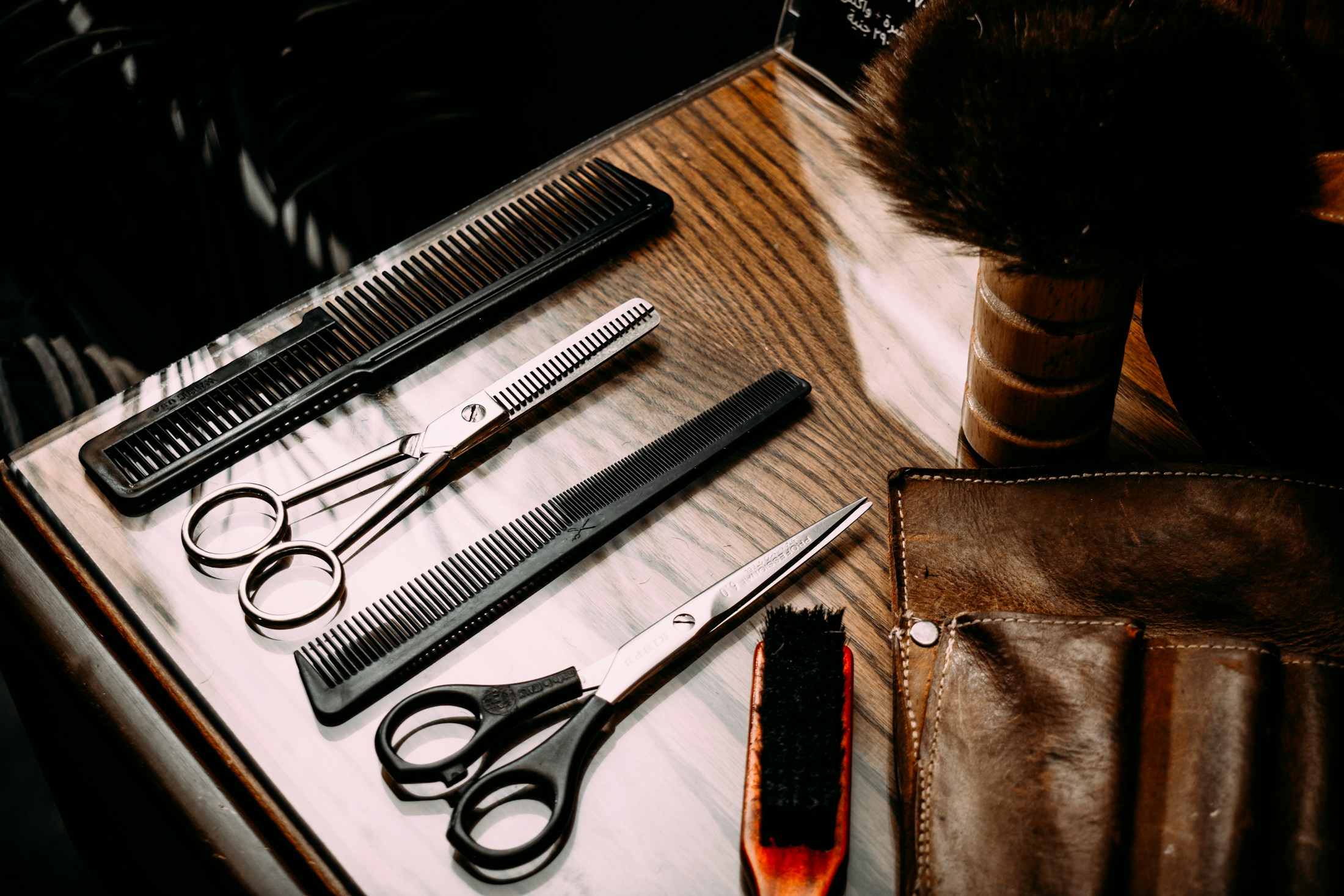 Collection of premium Japanese scissors neatly arranged on leather case