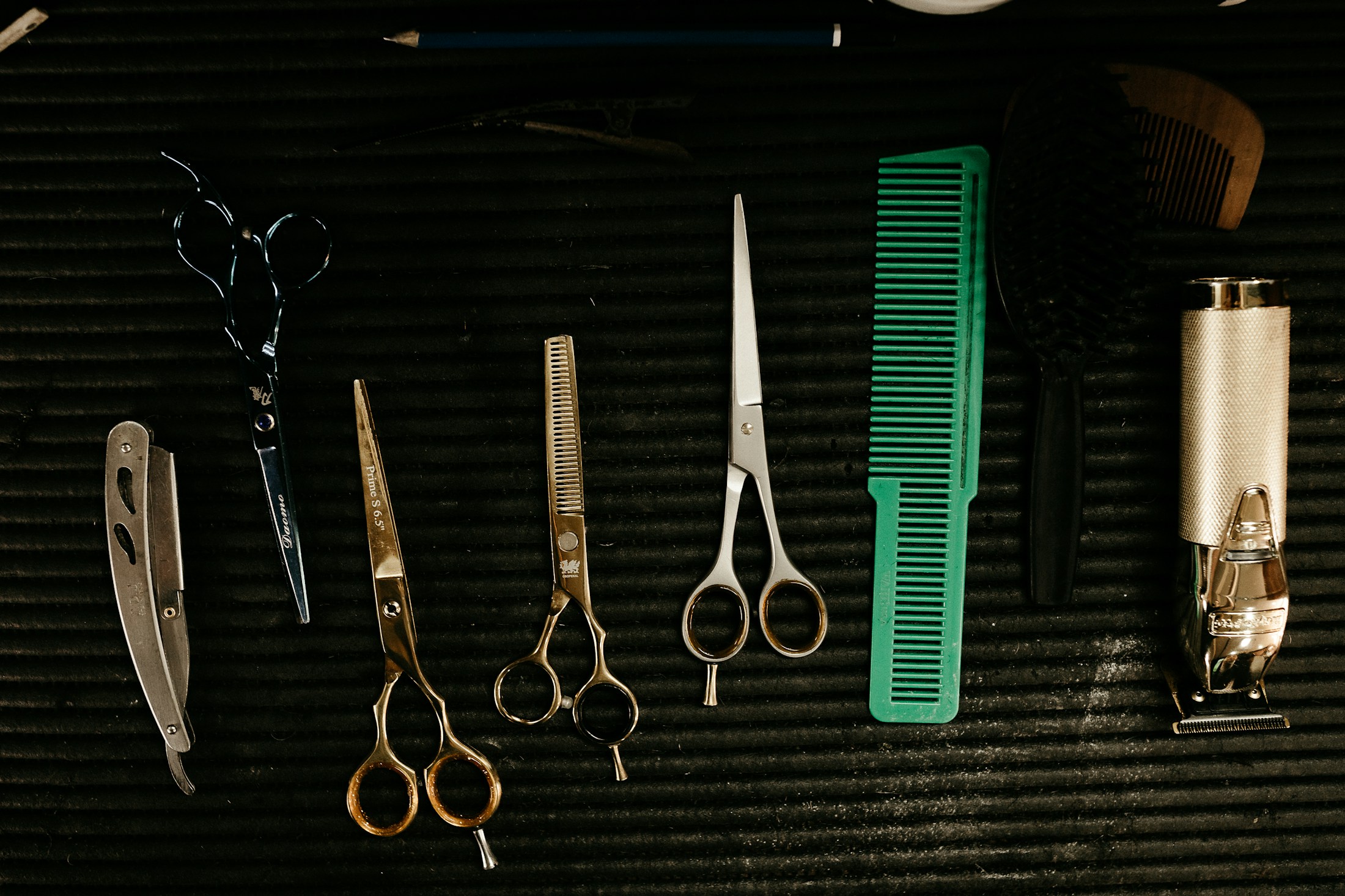 Yasaka offset scissors and comb laid out ready for a salon service