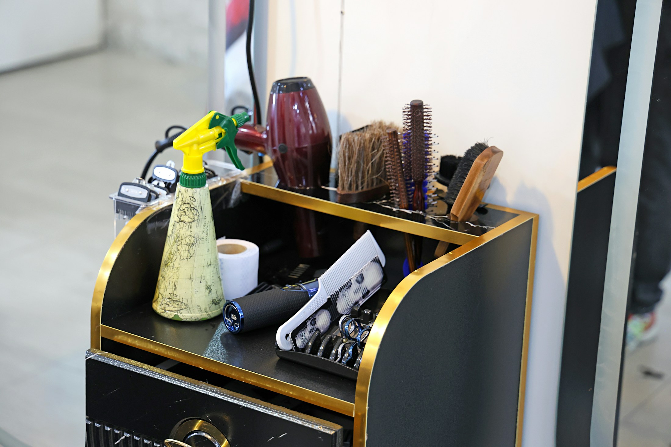Yasaka scissors and styling tools organised on a trolley