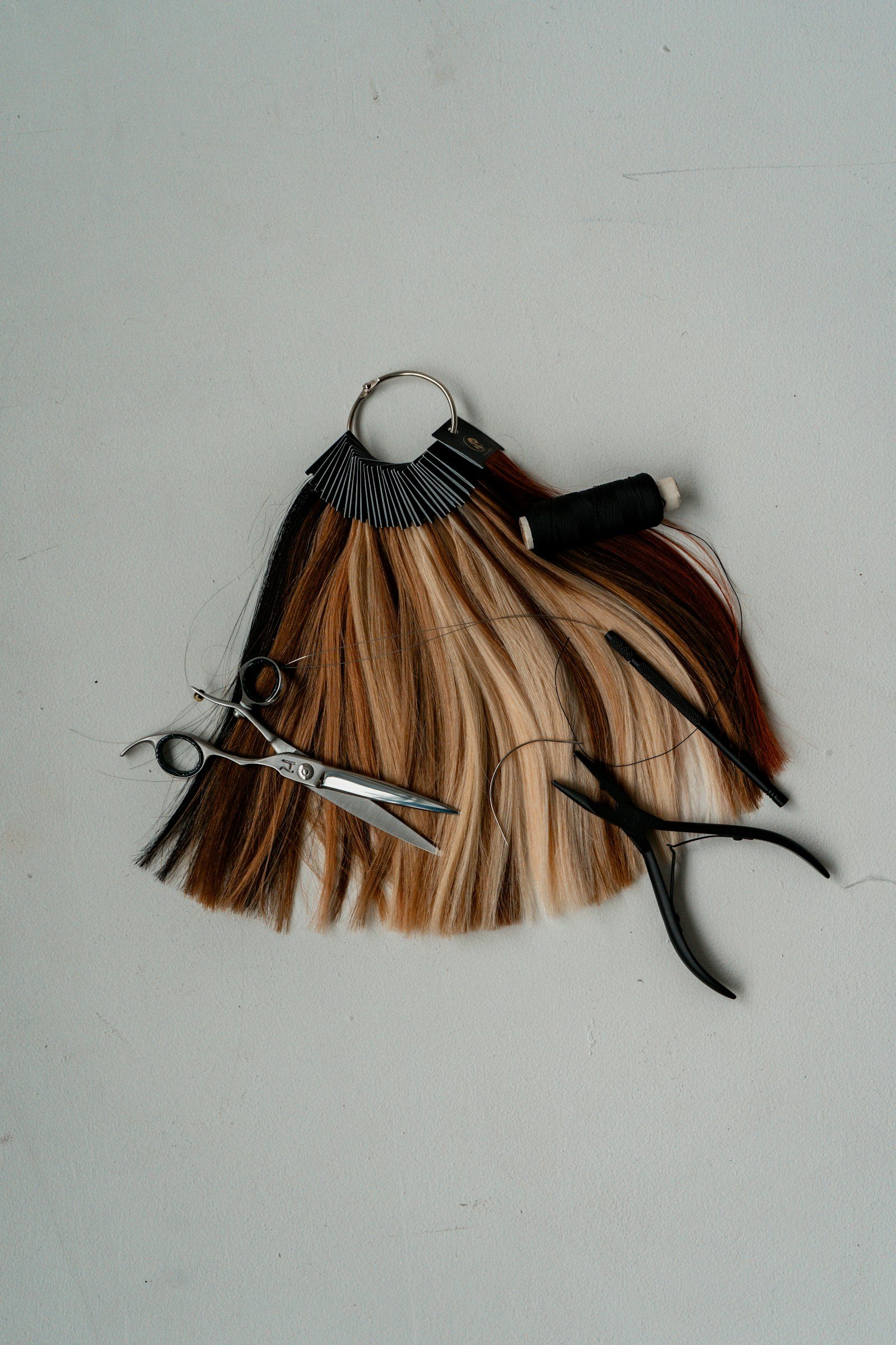 Chunker shears laying on highlighted hair section